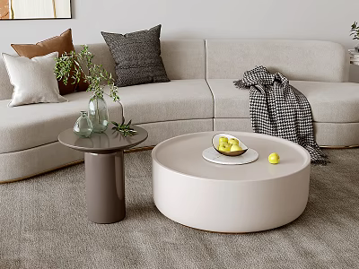 Modern Round White Coffee Table In Living Room With Fruit Plate Lemons Sofa Pillows 3d model