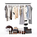Various Clothes on Hanger with Different Styles and Accessories Like Bags Shoes Hats
