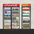 Coca Cola and Fanta Branded Beverage Refrigerators Fully Stocked with Various Drinks