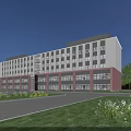 Modern Office Building with White and Red Exterior Surrounded by Green Lawns and Trees