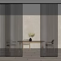 Modern Wooden Sliding Doors with Vertical Slats in Minimalist Dining Area with Table and Plant