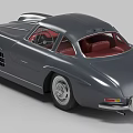 Classic Gray Mercedes Sports Car With Red Interior And Streamlined Vintage Design