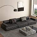 Black Leather Sectional Sofa with Plush Cushions Floor Lamp and Coffee Table in Living Room