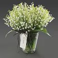 Transparent Vase With Lily of the Valley Flowers Brown Ribbon And Love Tag Decoration
