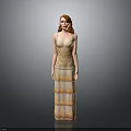 Woman With Long Red Hair Wearing Golden Fringed Long Dress Against Grey Background