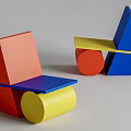 Modern Geometric Accent Chair With Red Blue Yellow Color Blocks And Abstract Structure Design