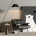 Black Leather Leisure Chair With Floor Lamp Side Table Polar Bear Painting And Gray Carpet