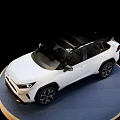 White Toyota SUV Showcased On Blue Circular Display Platform With Black Background