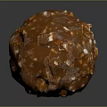 Caramel Colored Nutty Candy Ball with Glossy Texture and Crunchy Nut Pieces