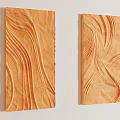 Two Orange Wavy Textured Rectangular Wall Decor Pieces on Light Background Wall