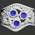 Silver Ring With Blue Gemstones And Intricate Carvings On Band