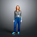 Woman Standing Against Gray Background Wearing Gray Long Sleeve Top Blue Jeans And Blue Shoes