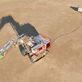 Heavy Duty Functional Excavator Connected To Trailer On Sandy Ground
