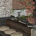 Japanese Style Courtyard Garden With Wooden Tea Table Candles And Autumn Leaves