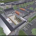 Aerial View Of Industrial Workshop Complex With Greenery Parking Area And Road Network