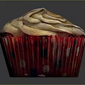 Delicious Fluffy Cupcake With Swirled Frosting And Red Polka Dot Wrapper