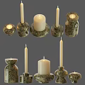 Natural Textured Stone Candle Holders With White Lit Candles And Various Designs