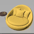 Modern Yellow Round Lounge Chair with Soft Cushions and Small Round Side Table with Bowl