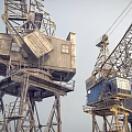 Industrial Equipment Tower Cranes With Vintage Metal Structure And Operator Cabins