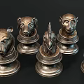 Detailed Animal Head Metal Sculptures With Various Wildlife Figures And Ornate Bases