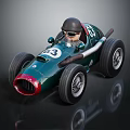Vintage Green Racing Car Model With Number 63 Driver Black Helmet Goggles And Large Wheels