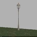 Illuminated Outdoor Lamp with Classic Design and Decorative Post Standing on Green Grass