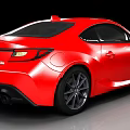Red Sports Car With Sleek Exterior Design Black Wheels And Front Fascia Details