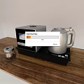 Stylish Kitchen Countertop With Silver Electric Kettle Coffee Maker And Glass Jar