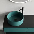 Modern Bathroom Washbasin Vanity With Round Mirror Green Basin And Black Countertop