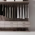 Organized Walk in Closet Interior With Hanging Clothes Shelves Drawers And Shoes