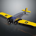 Detailed Model Airplane With Yellow Wings Gray Body And Black G Letters On Wings