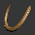 Golden Circular Metal Sculpture With Shiny Surface And Curved Design Details