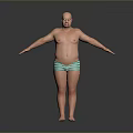 Bald Shirtless Man Standing With Arms Outstretched In Green Striped Shorts Against Gray Background
