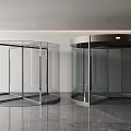 Modern Glass Revolving Doors With Metal Frames In Commercial Lobby Interior