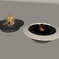 Round Black and White Fire Pits With Burning Flames And Black Pebbles
