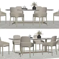 Modern Dining Table And Chair Set With Six Light Colored Chairs And Flower Vase