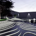 Garden Landscape Design With Wavy Illuminated Pathways Water Circular Lights And Trees