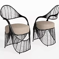 Stylish Black Rattan Leisure Chairs With Curved Design And Beige Cushions