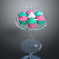 Colorful Pink And Green Cupcakes On Transparent Stand With Glass Dome