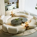 Modern Curved White Plush Sofa and Round Coffee Table Set with Green Plants Floor Lamps