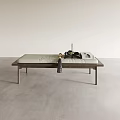 Modern Minimalist Wooden Ottoman With Light Green Cushion And Decorative Items On Gray Floor
