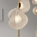 Modern Floor Lamps with Golden Black Poles and Transparent Petal Shades in Minimalist Living Room