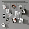 Creative Photo Wall With Family Photos And Art Prints Hanging On Strings