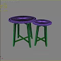 Two Modern Dark Colored Round Top Stools with Three Legs Design 3d model