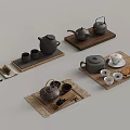 Various Ceramic Tea Sets With Teapots Cups And Wooden Serving Trays 3d model