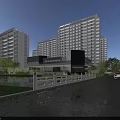 Modern High Rise Residential Community With Water Feature Greenery And Cars On Road