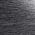 Black Stone Wall Surface With Horizontally Arranged Slate Strips Natural Texture And Shiny Finish