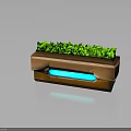Green Leafy Plants In Modern Brown Planter With Blue Glowing Base