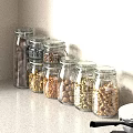 Neatly Arranged Glass Jars Filled With Assorted Nuts On Kitchen Countertop