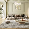 Beige L Shaped Velvet Sofa With Round Coffee Table And Decorative Pillows On Light Carpet